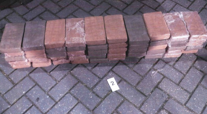 cocaine smokkel haven rotterdam, smokkelaars cocaine rotterdammers, 200 kilo cocaine vis rotterdam, haven rotterdam drugssmokkel