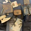 Tienduizenden euro's aan merkkleding in beslag bij man op Schiphol met cash en sieraden